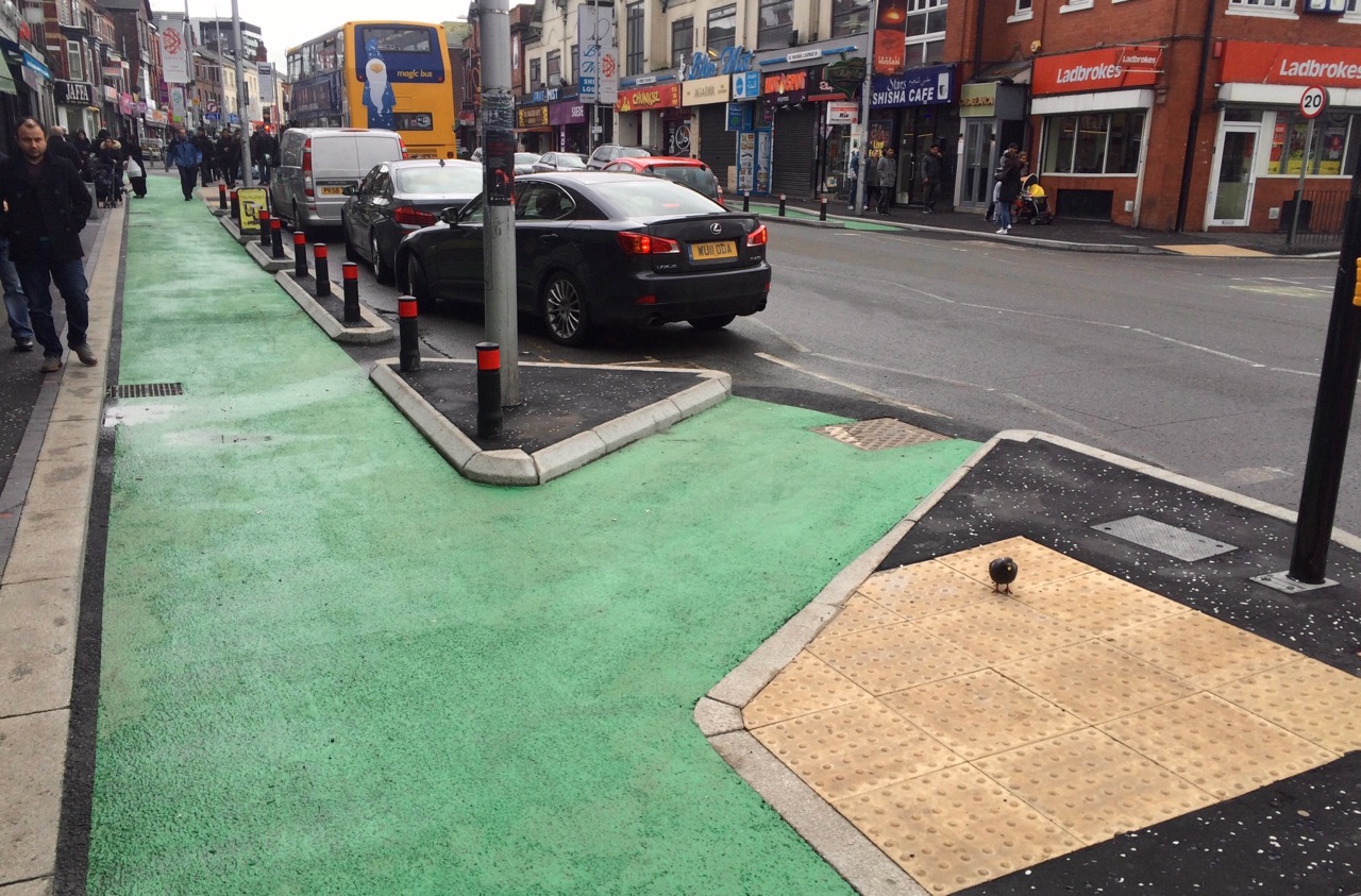 Pedestrians in the protected cycle lane
