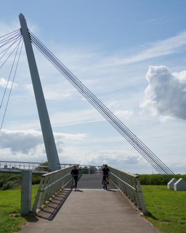 2 cycle users coming down the ramp.