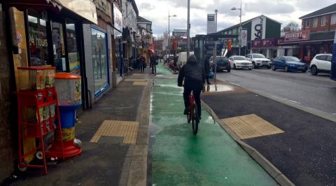 A bus stop bypass on the Curry Mile