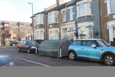 An alternative to a car parking space is a bike hanger lockable store for several bikes