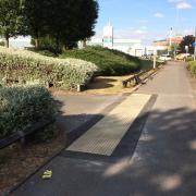 Textured tiles at a pedestrian entrance to Fort Shopping Centre.