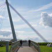 2 cycle users coming down the ramp.