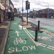 A pedestrian island for a signalised crossing.