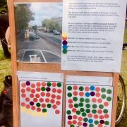 This photo shows the setup of the board that we used to ask people's opinions about the photo of the two types of cycle infrastructure.