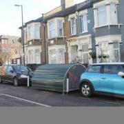 An alternative to a car parking space is a bike hanger lockable store for several bikes