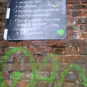 Sign giving instructions on what to do if the lights are out in Edgbaston tunnel