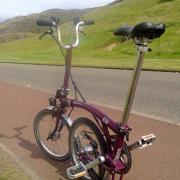 Buster the Brompton below Arthur's Seat
