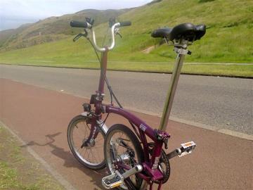 Buster the Brompton below Arthur's Seat